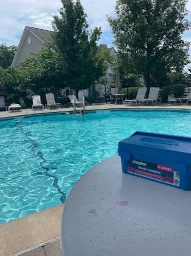 Pool water testing equipment at a clear swimming pool